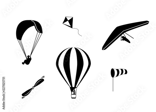Set of vector icons hot air balloon, paragliding, hang-gliding, windsock, propeller and kite in black color isolated
