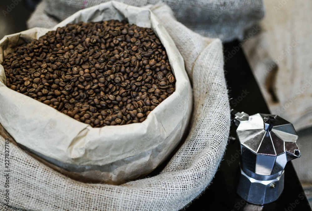 Big Vintage Brown Coffee Bags With Black Roasted Beans And Geyser Coffee Maker Standing Nearby Cafe Interior Decorations Closeup Stock Photo Adobe Stock