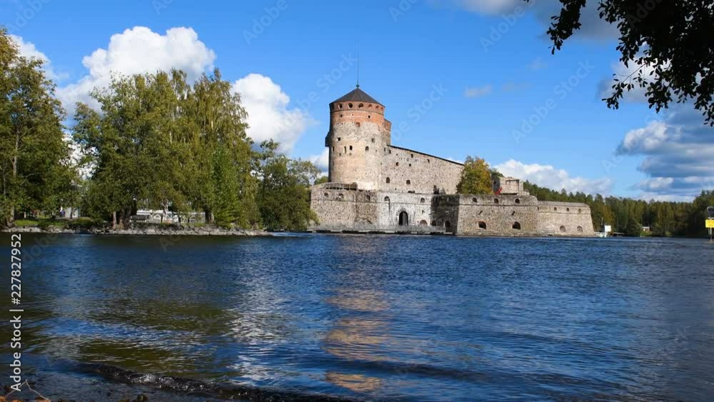 Beautiful Fortress Olavinlinna in Savonlinna (Finland) - the castle of St. Olaf. A historic place where the annual international Opera festival is held. Beautiful Fortress Olavinlinna in Savonlinna (Finland) - the castle of St. Olaf. A historic place where the annual international Opera festival is held.