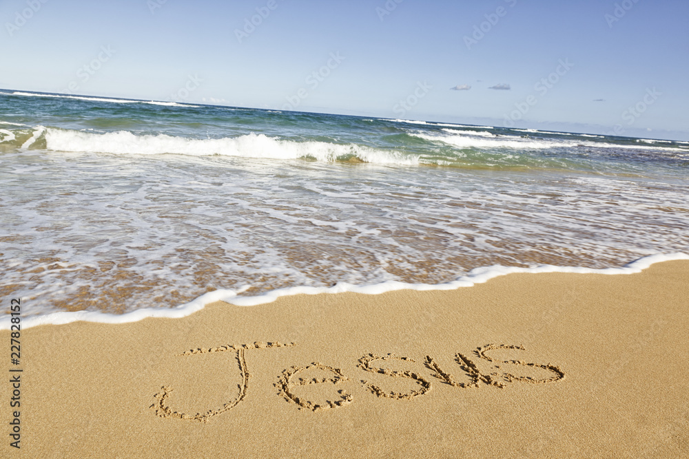 Fototapeta premium word written in sand on tropical beach