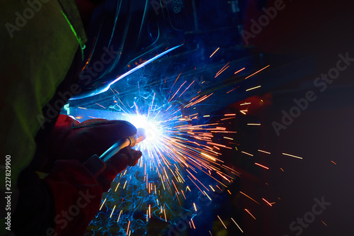 Quadro em tela sparks during welding at the production process in semi-automatic welding of met