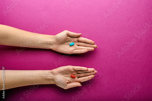 The choice between the red and blue tablet, pill in the matrix. A reference to the famous film 