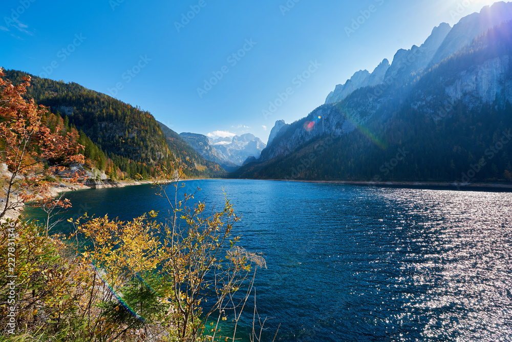 Colorful autumn landscape with mountains, lake and trees in Austrian Alps. Salzkammergut, Gosausee