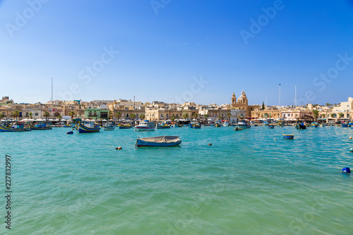 Fototapeta Naklejka Na Ścianę i Meble -  Marsaxlokk, Malta. Scenic view of the city from the bay