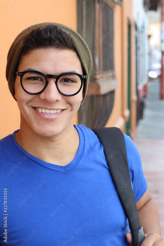 Cute young ethnic hipster smiling Cute young ethnic hipster smiling