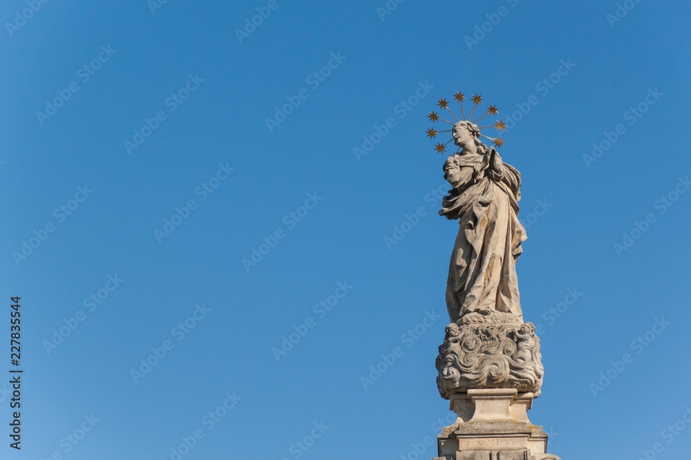 Baroque statues of saints. Detail of baroque plague column in the town of Valtice in southern Moravia. Work of art. Built in 1690.