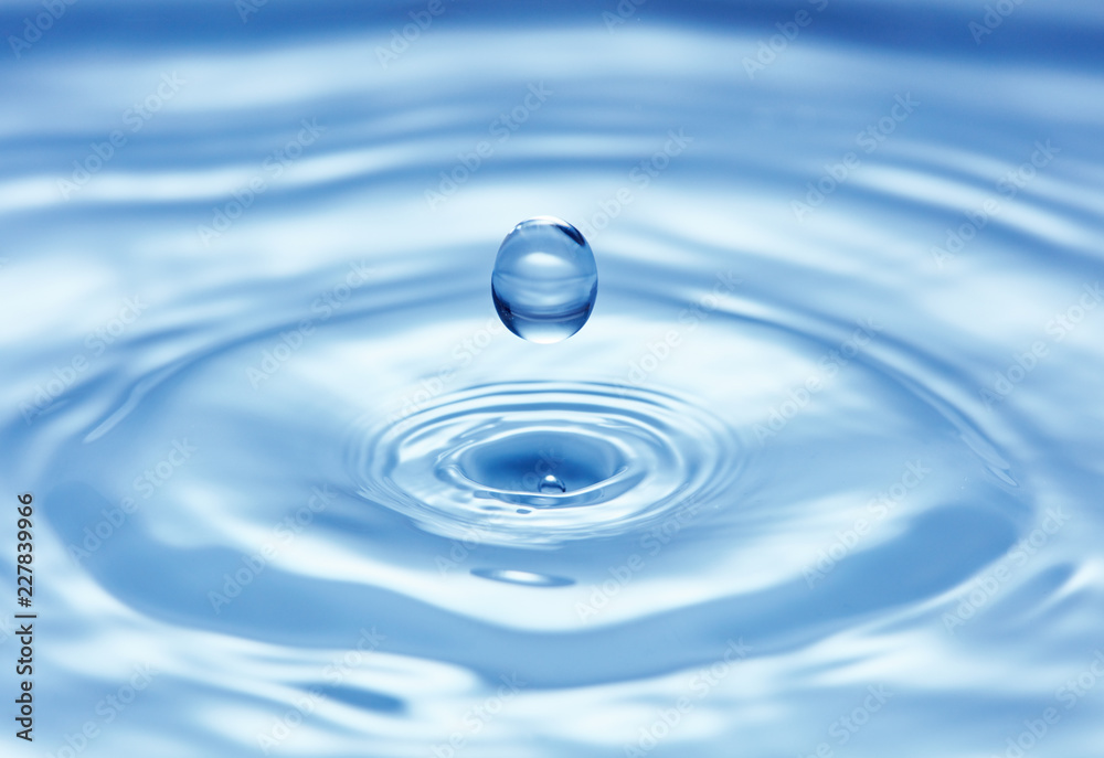 pure blue water surface with droplet splash pure blue water surface with droplet splash