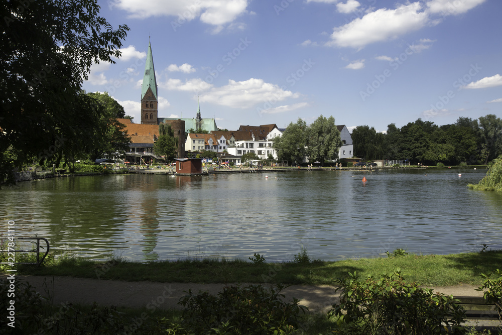 Mill pond (Muhlenteich) in Lubeck , Germany Mill pond (Muhlenteich) in Lubeck , Germany