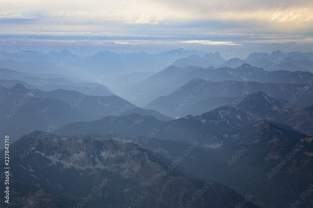 Flying high above the Cascade mountains in Washington State Flying high above the Cascade mountains in Washington State