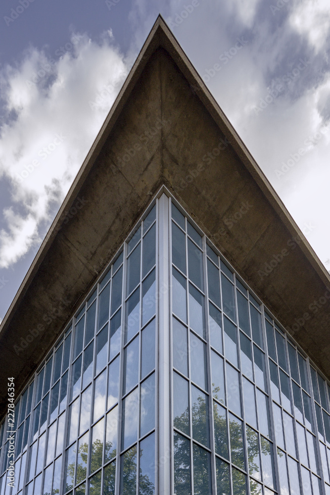 LONDON, UK - AUGUST 6, 2018: Exterior architectural facade of the Design Museum gallery located in Kensington, West London, UK. LONDON, UK - AUGUST 6, 2018: Exterior architectural facade of the Design Museum gallery located in Kensington, West London, UK.