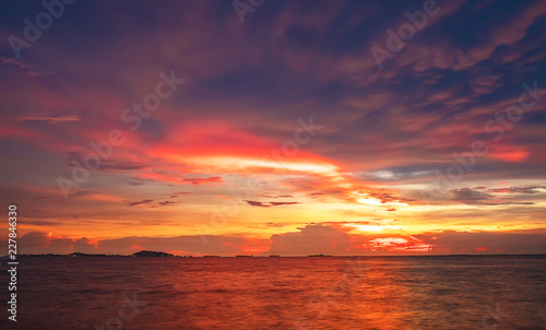 Twilight sky background. Colorful Sunset sky and cloud.vivid sky in twilight time background.Fiery orange sunset sky. Beautiful