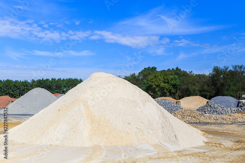 White Sand Mound:  Mound of White sand used for landscaping and driveways on display and for sale. photo