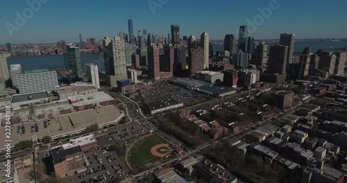 Jersey City Aerials Flying Towards Downtown Manhattan Viewing Baseball Field photo