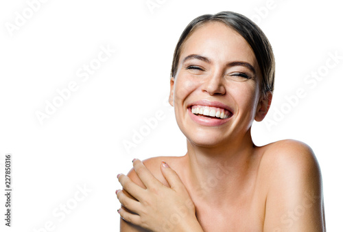 beauty portrait of attractive young caucasian smiling woman brunette isolated on white studio shot  lips toothy smile facer head and shoulders cheerful teeth neck hand