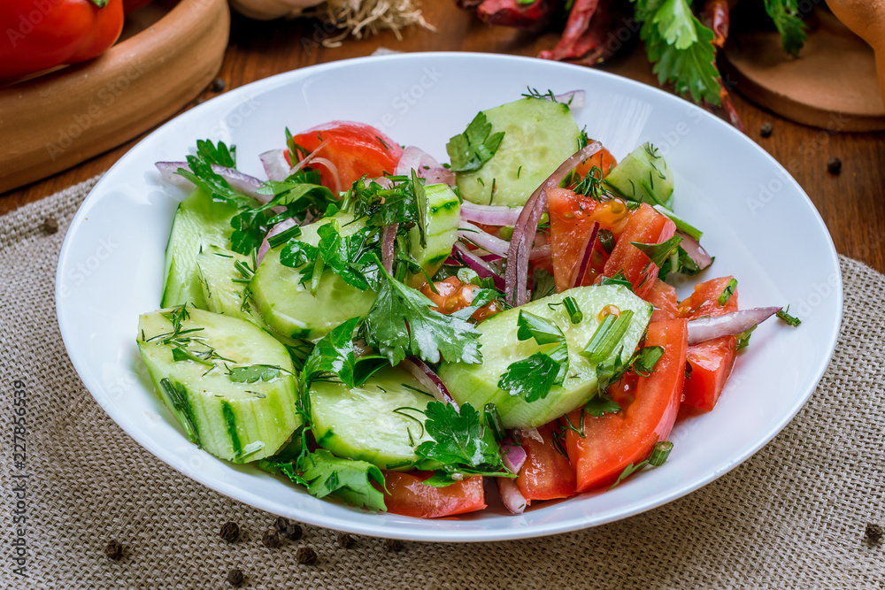 Vegetable salad with tomatoes and cucumbers Vegetable salad with tomatoes and cucumbers