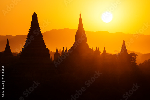 Silhouettes of Burmese Pagodas during sunset from the view of Shwesandaw Pagoda, Bagan, Myanmar