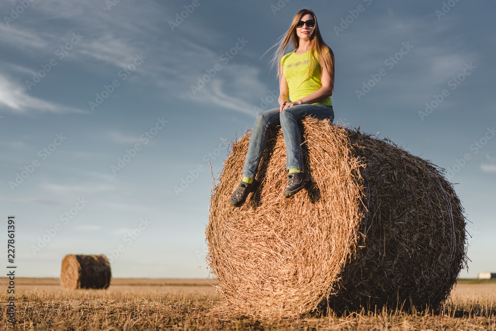 Young woman outdoors in a corn field Young woman outdoors in a corn field