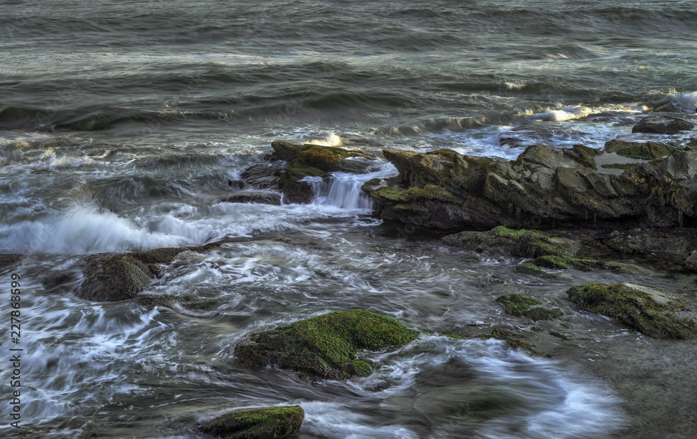 Long Exposure Image of waves crashing over the rocks at Beavertail State Park, Jamestown, Rhode Island (RI)