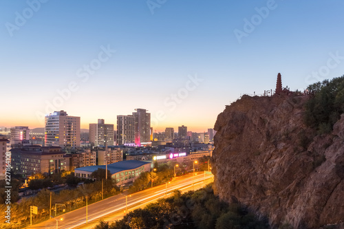 beautiful urumqi cityscape in sunset photo