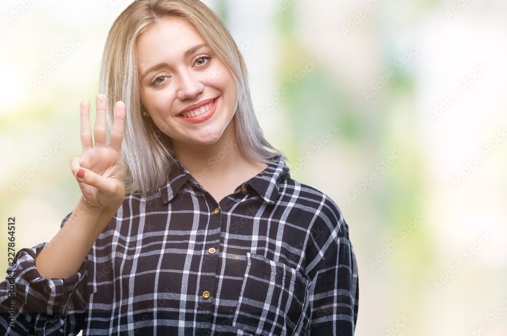 Young blonde woman over isolated background showing and pointing up with fingers number three while smiling confident and happy.