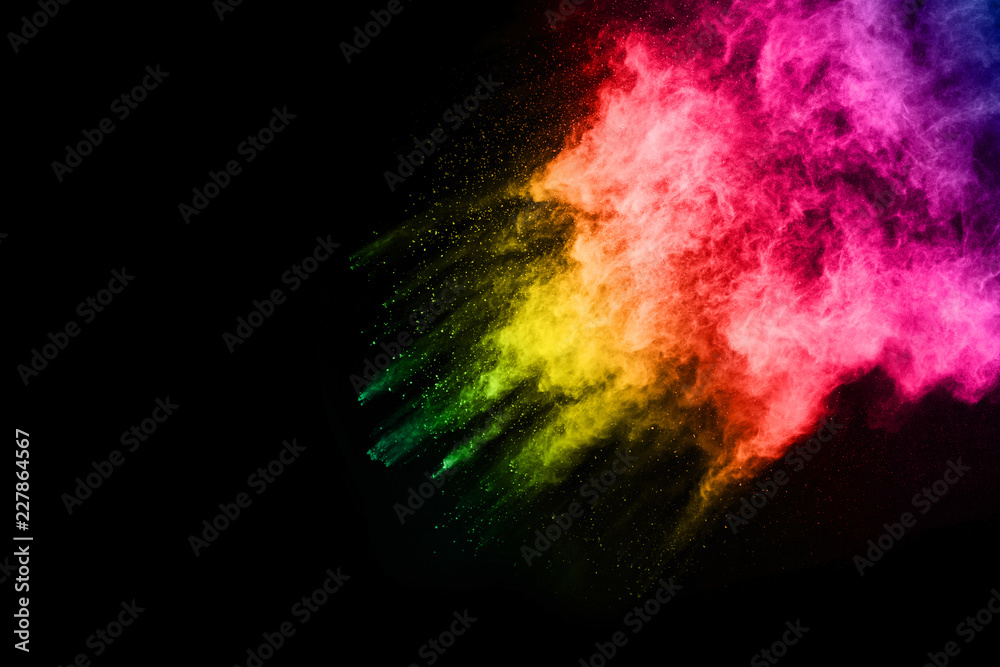 Fototapeta premium abstract colored dust explosion on a black background.abstract powder splatted background,Freeze motion of color powder exploding/throwing color powder, multicolored glitter texture.