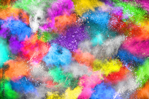 abstract colored dust explosion on a black background.abstract powder splatted background,Freeze motion of color powder exploding/throwing color powder, multicolored glitter texture.