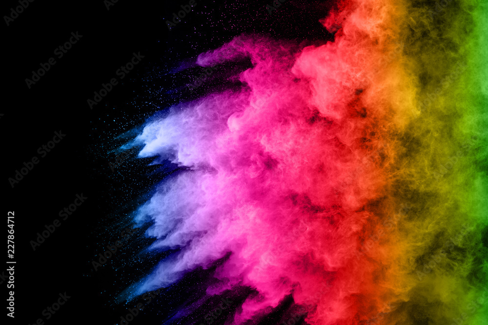 abstract colored dust explosion on a black background.abstract powder splatted background,Freeze motion of color powder exploding/throwing color powder, multicolored glitter texture.