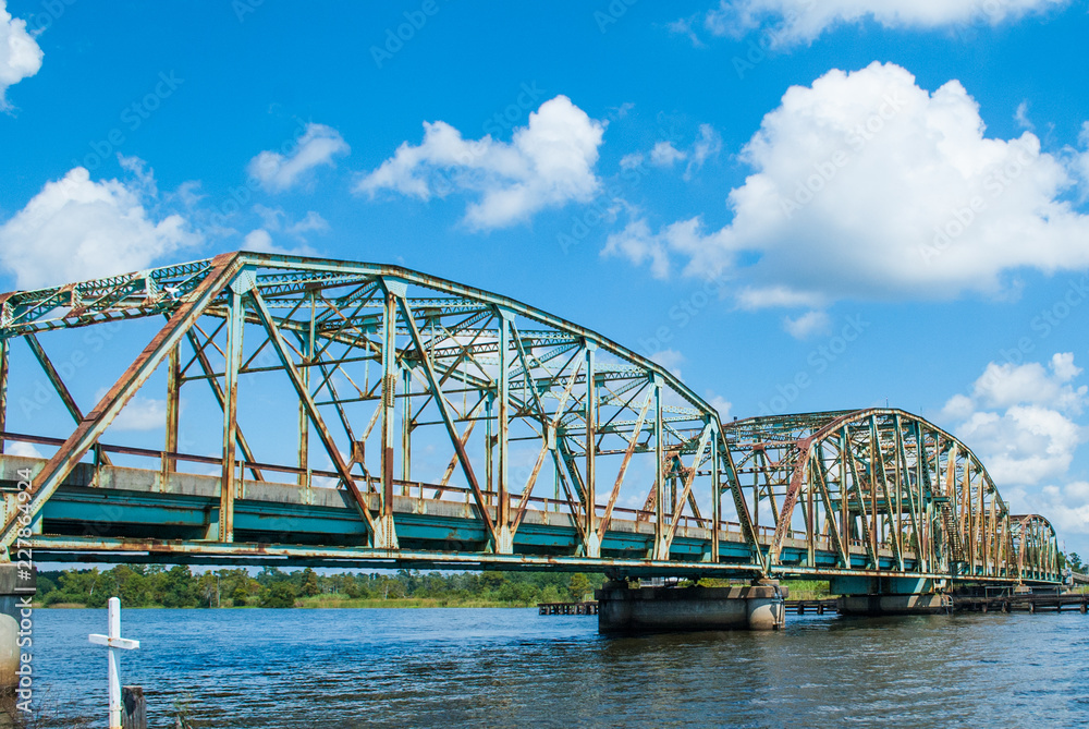 The Pearl River Swing Bridge that connects Louisiana to Mississippi. The solid metal structure is on highways 90 in the southern states of America