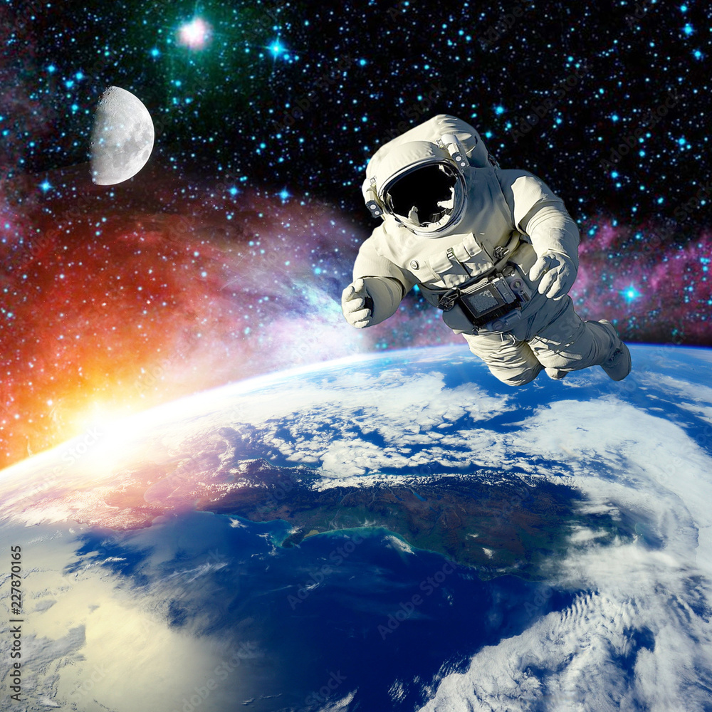 Fototapeta premium the astronaut fliing outer space.elements of this image furnished by NASA