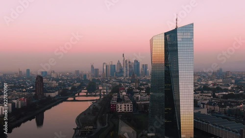 Frankfurt ECB Skyline Aerial Shot at early sunrise reflecting sun