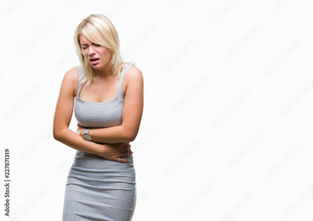 Young beautiful blonde woman over isolated background with hand on stomach because nausea, painful disease feeling unwell. Ache concept. Young beautiful blonde woman over isolated background with hand on stomach because nausea, painful disease feeling unwell. Ache concept.