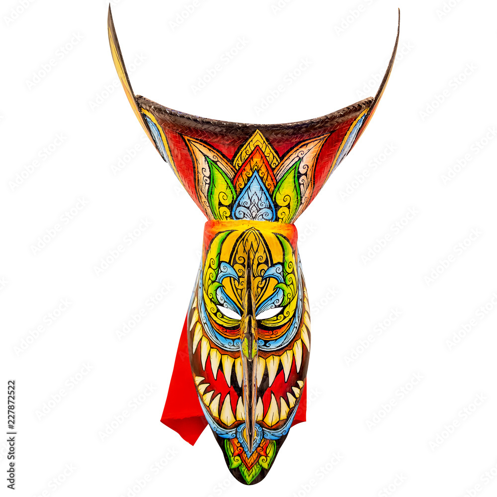 Obraz premium Vintage Phi Ta Khon mask from Ghost Festival, Thailand. Isolated on white background include clipping mask. Selective focus 