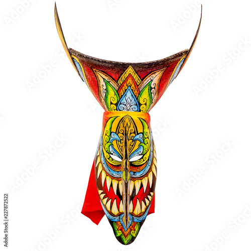 Vintage Phi Ta Khon mask from Ghost Festival, Thailand. Isolated on white background include clipping mask. Selective focus 