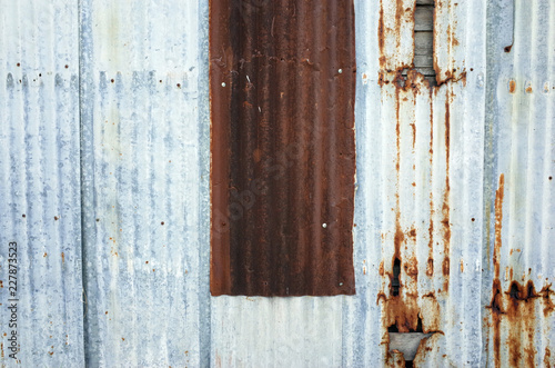 old rusty galvanized iron wall texture © North