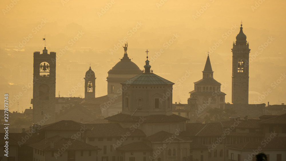 Bergamo. One of the beautiful city in Italy. Morning landscape at the old town from Saint Vigilio hill during fall season