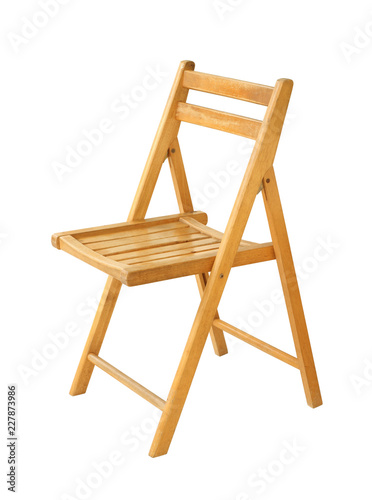 Wooden folding chair (with clipping path) isolated on white background photo