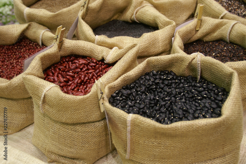 Black, Red Beans and Grains in Burlap Sacks