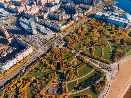Park 300 years of St. Petersburg. Art landscape design. Labyrinths trees and bushes with yellowing autumn foliage. Radial crossing roads. view from top