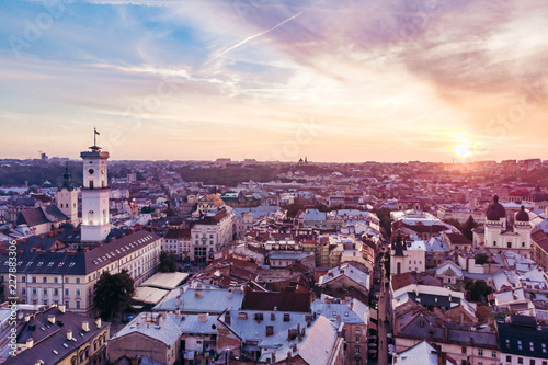 aerial view of sunset above european city © phpetrunina14