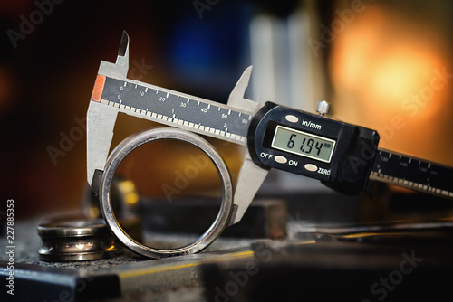 Electronic calipers on an old bearing detail