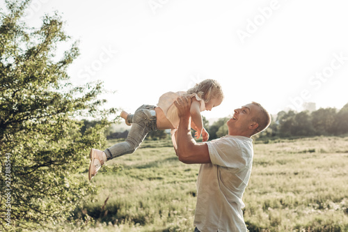 Happy Father and Daughter Having Fun, Enjoying Sunny Summer Day