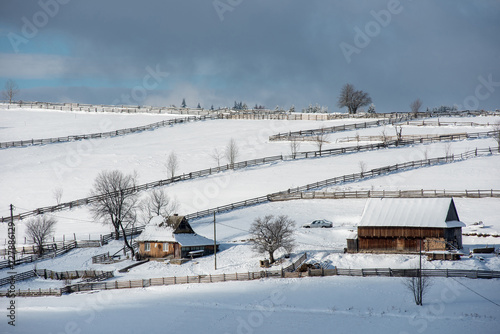 Alpine village in winter in Transylvania