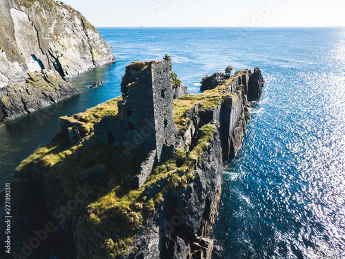 Castle in island above the sea in Ireland
