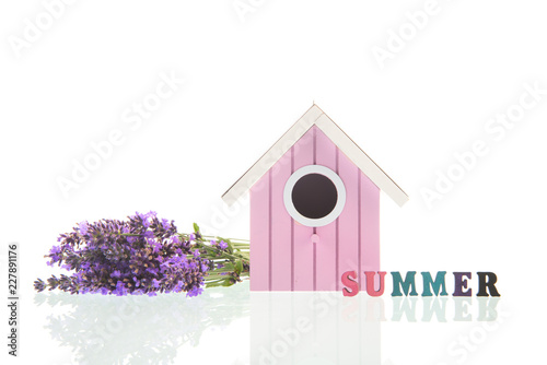 Fototapeta Naklejka Na Ścianę i Meble -  Bouquet Lavender with bird house on white background