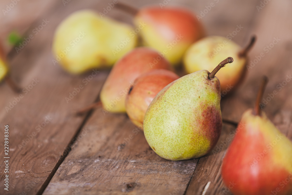 Several ripe pears lie on boards Several ripe pears lie on boards