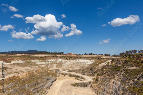 Old limestone mine panorama on bright sunny day photo