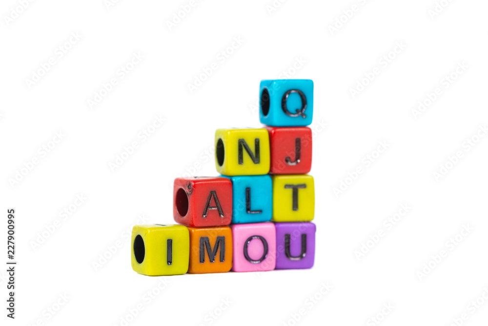 Pile of letter bead or beads with alphabet on white background. Pile of letter bead or beads with alphabet on white background.