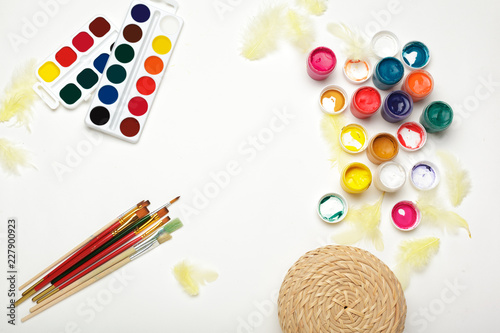 Top view of Watercolor Painting Supplies, Brushes and Colorful Pencil. Creation process of watercolor painting. Copy space.
