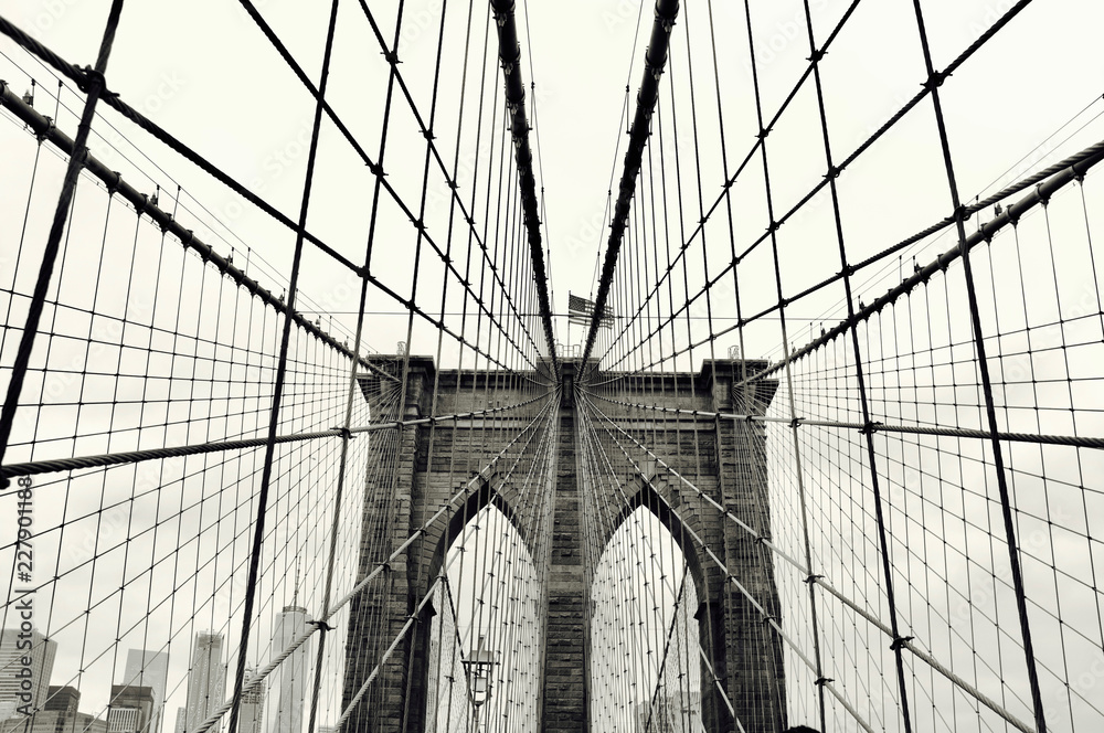 Obraz premium Brooklyn Bridge view with USA flag