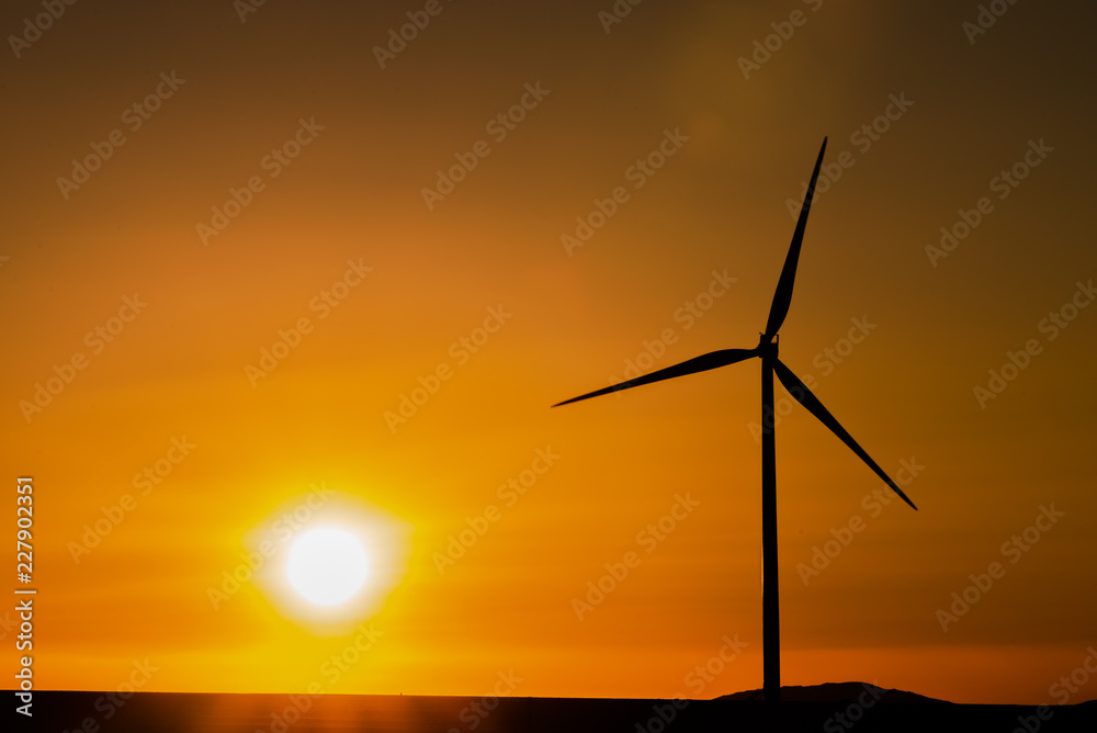 wind turbines silhouette at the sunset wind turbines silhouette at the sunset